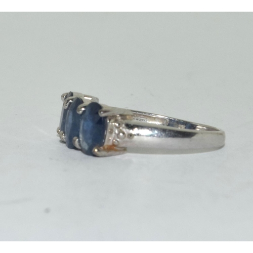 381 - 9ct white gold ladies 3 stone blue spinel ring size N