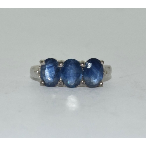 381 - 9ct white gold ladies 3 stone blue spinel ring size N