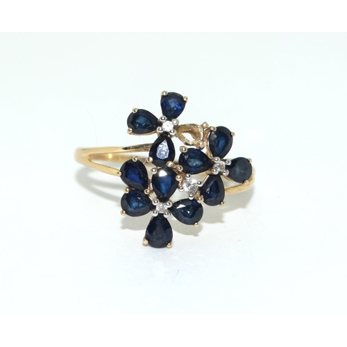 330 - 9ct gold ladies Sapphire and diamond cluster ring size R