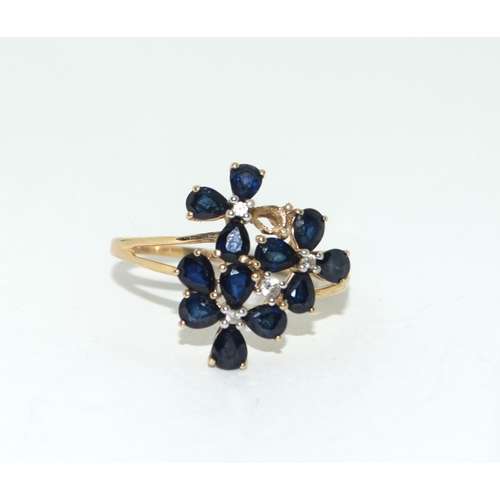 330 - 9ct gold ladies Sapphire and diamond cluster ring size R