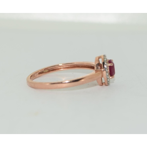 355 - 9ct gold ladies Ruby and diamond ring size M