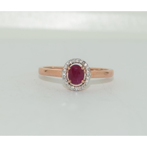 355 - 9ct gold ladies Ruby and diamond ring size M