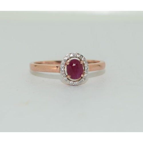 355 - 9ct gold ladies Ruby and diamond ring size M