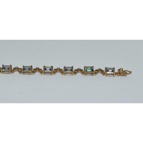 412 - 9ct gold Mystic topaz line bracelet