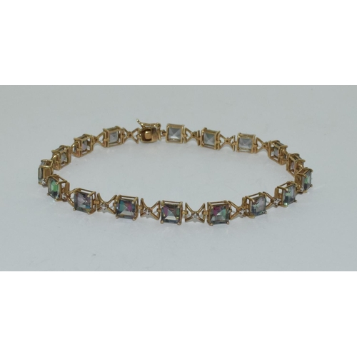 412 - 9ct gold Mystic topaz line bracelet