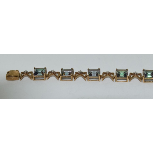 412 - 9ct gold Mystic topaz line bracelet