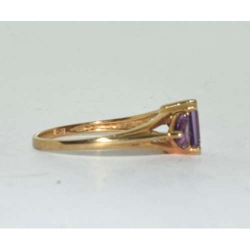 388 - 9ct gold ladies 3 stone Amethyst ring size Q