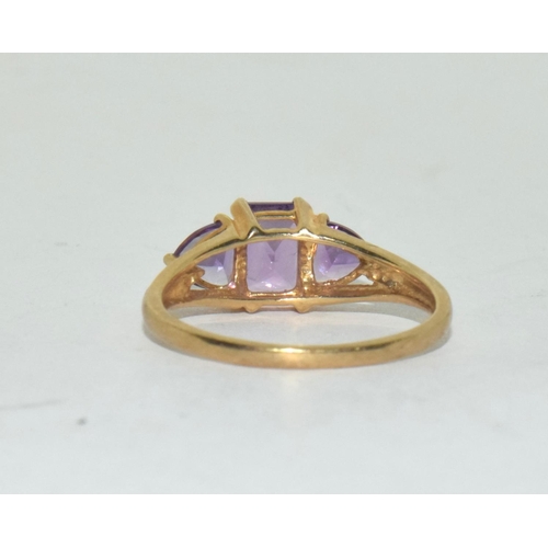 388 - 9ct gold ladies 3 stone Amethyst ring size Q