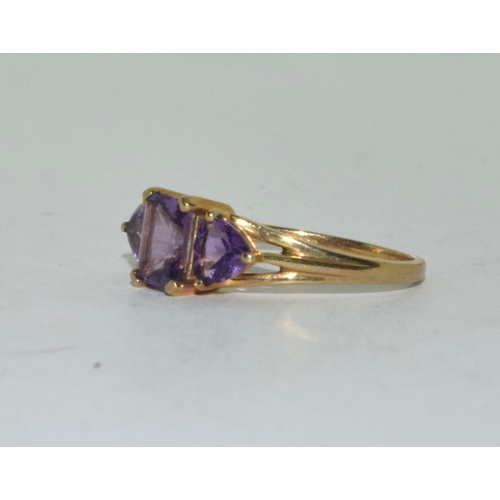 388 - 9ct gold ladies 3 stone Amethyst ring size Q