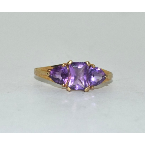 388 - 9ct gold ladies 3 stone Amethyst ring size Q