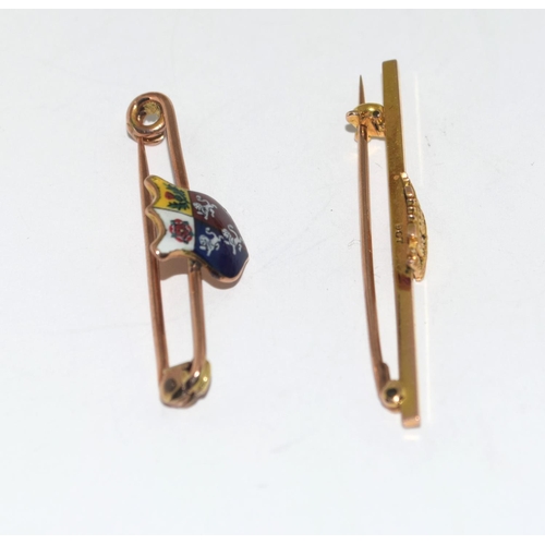 371 - 2 9ct gold Tie pins with crests