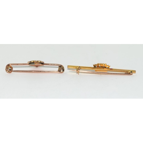 371 - 2 9ct gold Tie pins with crests