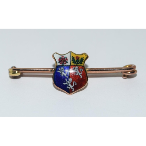 371 - 2 9ct gold Tie pins with crests