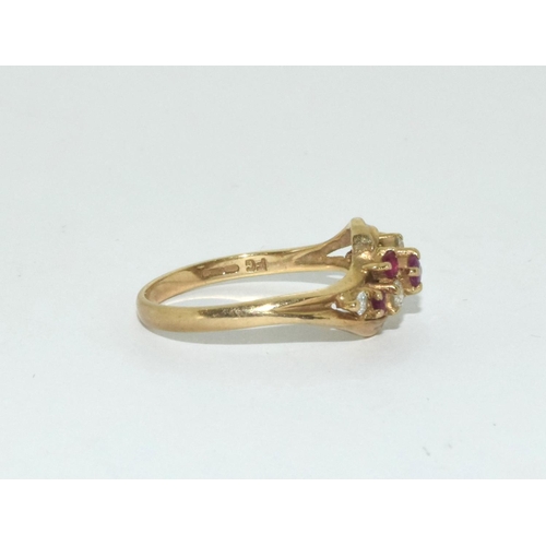 361 - 9ct gold ladies diamond and ruby twist ring size N