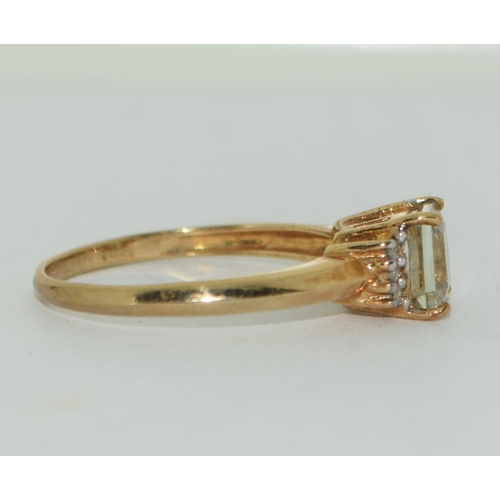 379 - 9ct gold ladies Lemon quarts and diamond chip ring size P