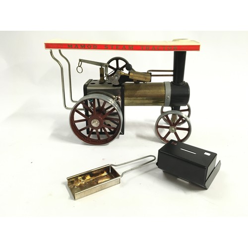 84 - Mamod Live Steam Tractor TE1A containing flywheel, canopy, whistle, burner, fire box, scuttle in bro... 