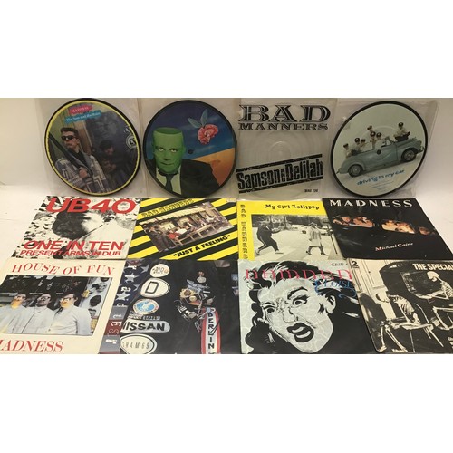 215 - 2 CARRY CASES OF VARIOUS 45rpm SINGLE RECORDS. This selection includes - Bad Manners - Madness - The... 