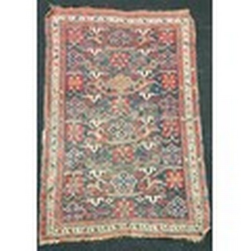 289 - A vintage Caucasian rug 180x120cm