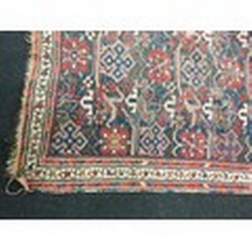 289 - A vintage Caucasian rug 180x120cm