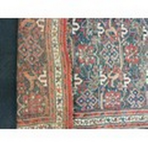 289 - A vintage Caucasian rug 180x120cm