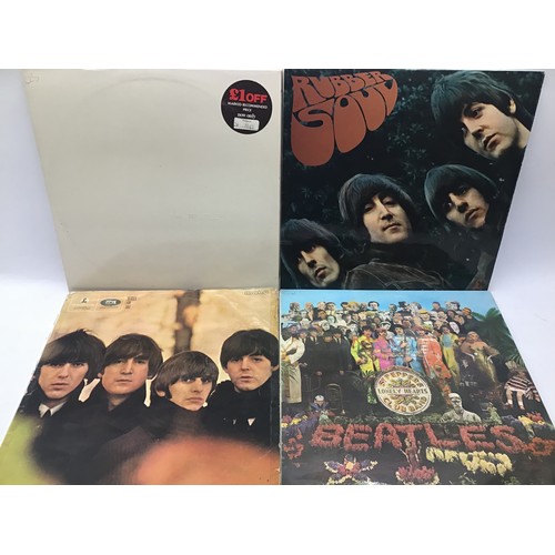 167 - COLLECTION OF 8 BEATLES ALBUMS. Firstly we have a copy of The White Album with embossed cover includ... 