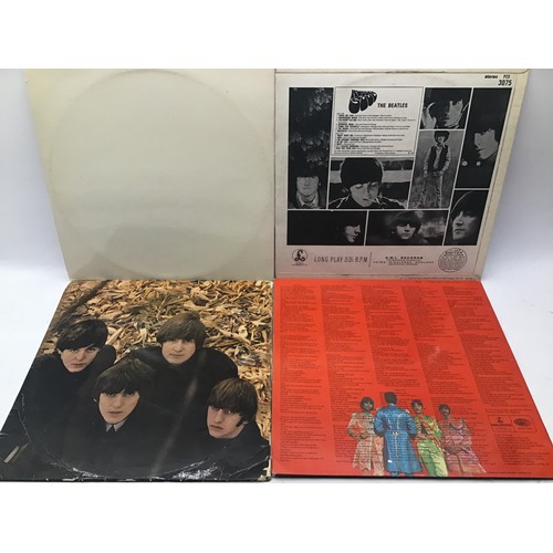 167 - COLLECTION OF 8 BEATLES ALBUMS. Firstly we have a copy of The White Album with embossed cover includ... 