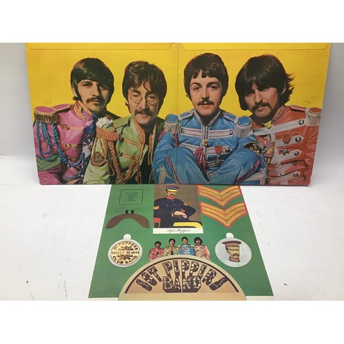 167 - COLLECTION OF 8 BEATLES ALBUMS. Firstly we have a copy of The White Album with embossed cover includ... 