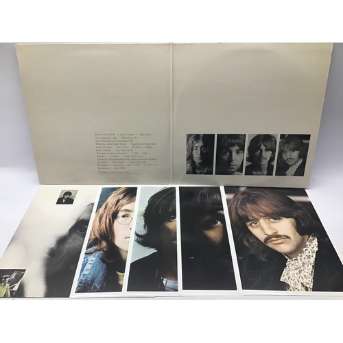 167 - COLLECTION OF 8 BEATLES ALBUMS. Firstly we have a copy of The White Album with embossed cover includ... 