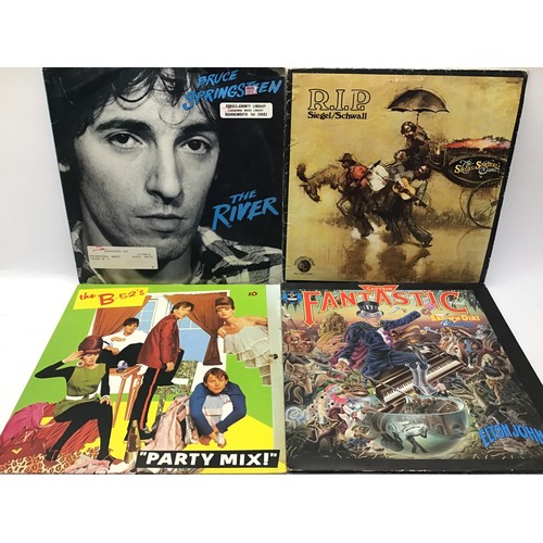 180 - 12 VINYL ROCK AND POP LP RECORDS. Great lot including - Bruce Springsteen - Phil Collins - David Bow... 