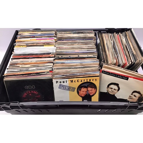 225 - LARGE MIX-MASH CRATE OF 7” SINGLES. Various decades and genres of 45rpm singles here found mainly in... 