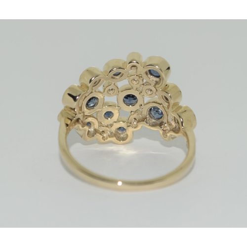 328 - A 9ct gold blue and white sapphire ring Size P