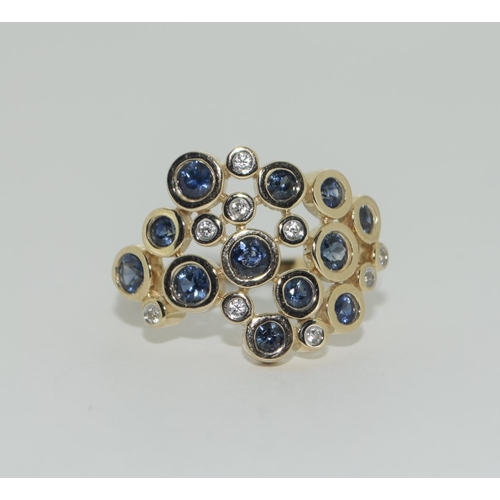 328 - A 9ct gold blue and white sapphire ring Size P