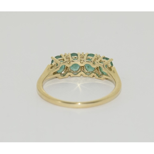 425 - 9ct Gold 4 stone Emerald ring. Size P 1/2.