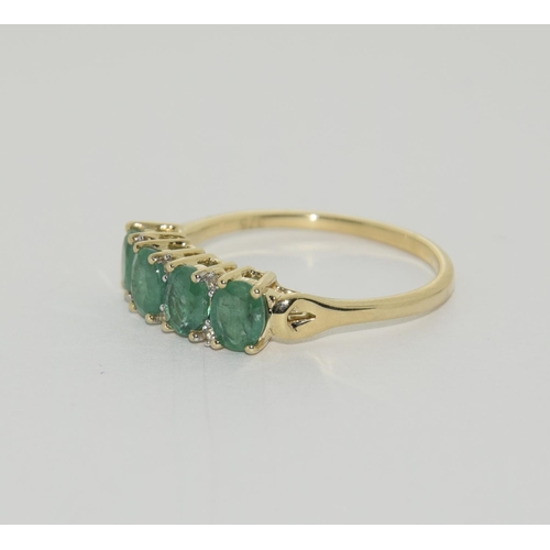 425 - 9ct Gold 4 stone Emerald ring. Size P 1/2.