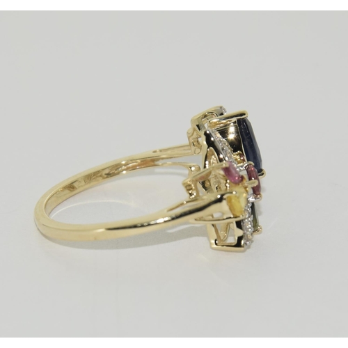 413 - 9ct Gold coloured sapphire ring. Size N 1/2.