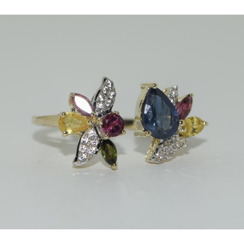 413 - 9ct Gold coloured sapphire ring. Size N 1/2.