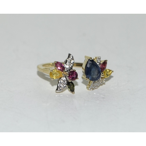 413 - 9ct Gold coloured sapphire ring. Size N 1/2.