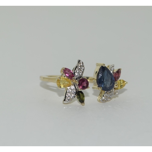 413 - 9ct Gold coloured sapphire ring. Size N 1/2.