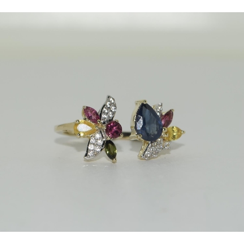 413 - 9ct Gold coloured sapphire ring. Size N 1/2.