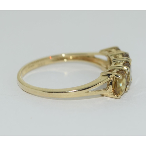 363 - A 9ct gold 4 stone sphere ring Size P