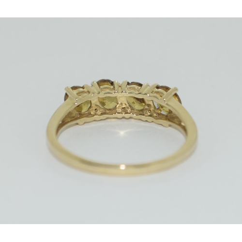 363 - A 9ct gold 4 stone sphere ring Size P