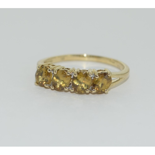 363 - A 9ct gold 4 stone sphere ring Size P