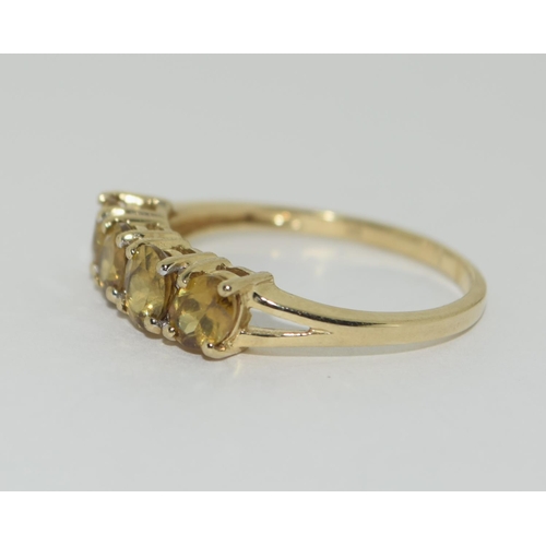 363 - A 9ct gold 4 stone sphere ring Size P