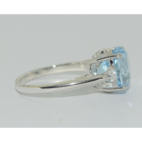 443 - Silver blue Topaz ring size O