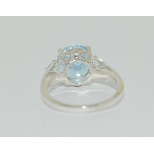 443 - Silver blue Topaz ring size O