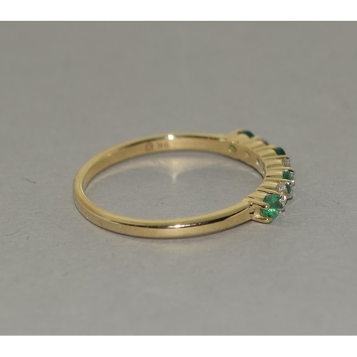 335 - A 9ct gold emerald white sapphire ring Size P 1/2.