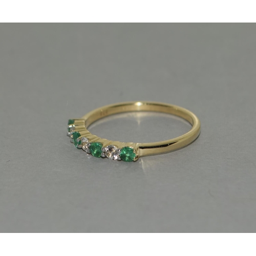 335 - A 9ct gold emerald white sapphire ring Size P 1/2.