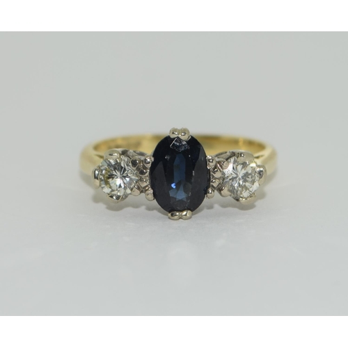 395 - An 18ct Diamond and Sapphire trilogy ring Size L