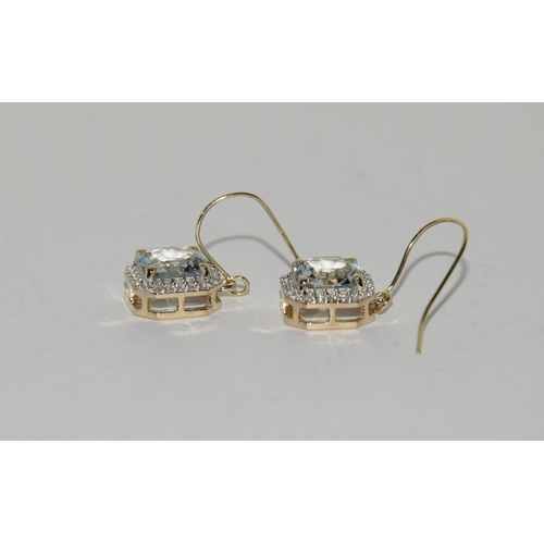 342 - 9ct Gold aquamarine earrings.