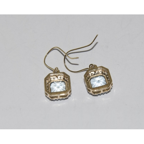 342 - 9ct Gold aquamarine earrings.